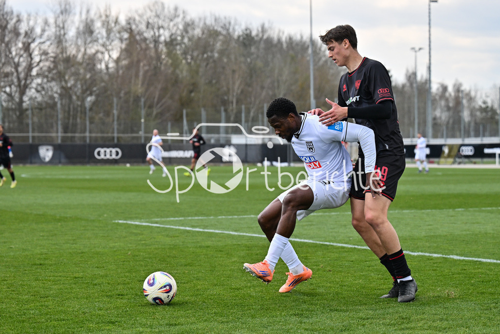 FC Ingolstadt - SSV Ulm 1846 Fussball  | INGOLSTADT, GERMANY - 25. MAERZ: im Duell Streli MAMBA (SSV Ulm 45) und Tomislav BAGARIC (FC Ingolstadt 49) während dem Testspiel zwischen dem FC Ingolstadt und dem SSV Ulm 1846 Fussball auf Platz 4 am Audi Sportpark