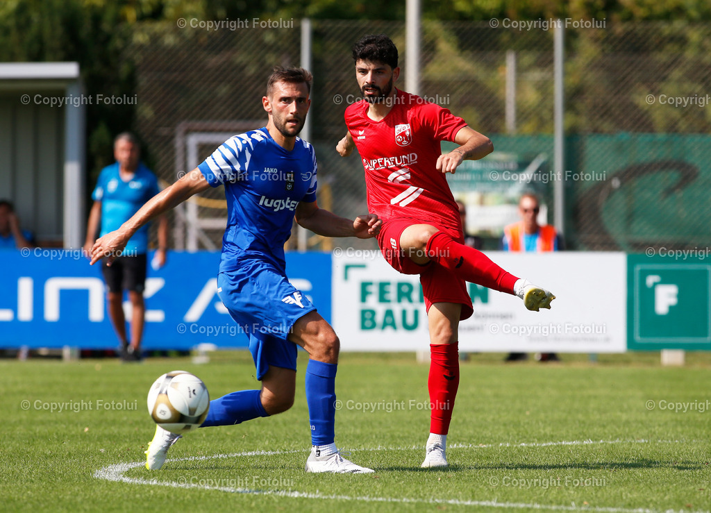 A_LUI_2608023_12 | SPORT,FUSSBALL,LT1 OOELIGA ASKOE OEDT-SPG FRIEDBURG/POENDORF 26.08.2023 IM BID: BUENJAMIN KARATAS (OEDT) UND MATTIA OLIVOTTO (FRIEDBURG) FOTO:FOTOLUI