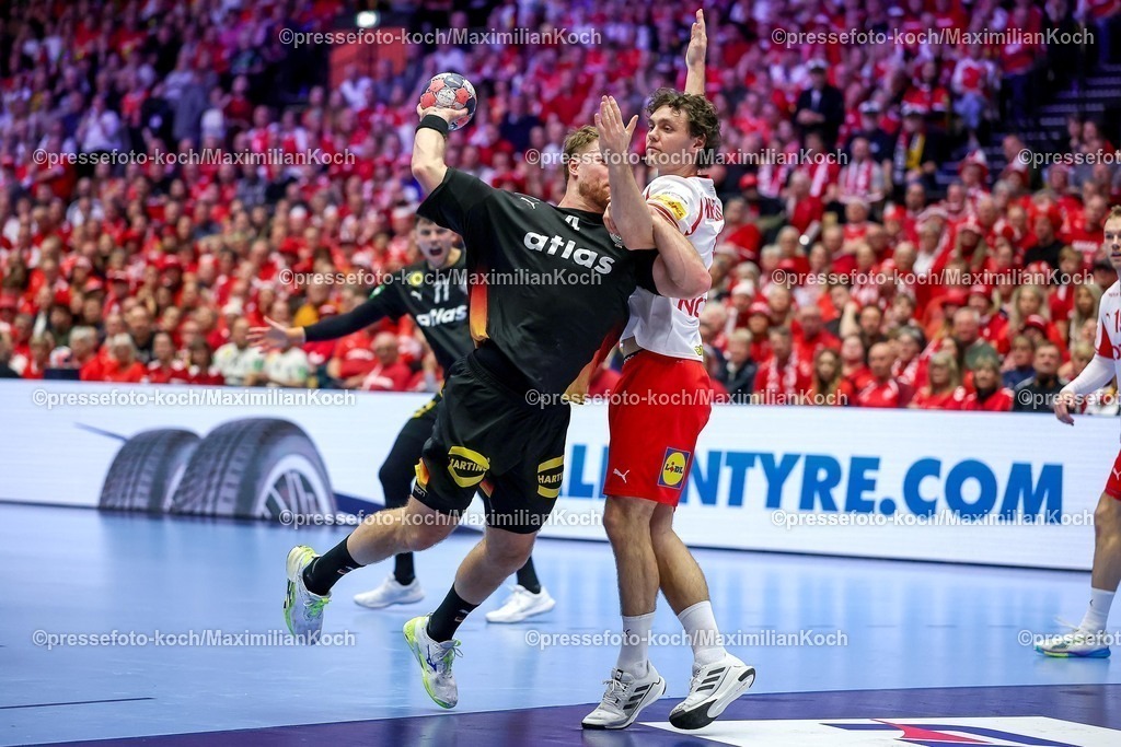 EHF26012603048 | 26.01.2026, Handball, Men's EHF EURO 2026, Deutschland - Dänemark, Jyske Bank Boxen in Herning, Dänemark, Main Round:   Johannes Golla (Germany #04) im Zweikampf gegen   Niclas Vest Kirkelokke (Denmark #03)