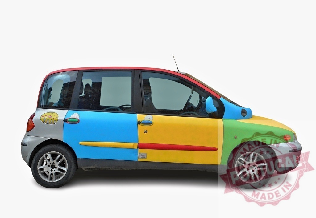 Colorful Fiat Multipla showing unique paint job on white background | Multicolored Fiat Multipla parked, showing a unique and artistic paint job, isolated on white - Realized with Pictrs.com