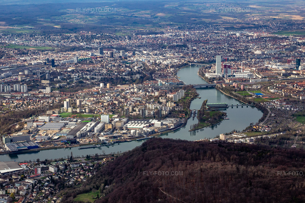 Aerial view: City view on the banks of the Rhine river and Basel in Birsfelden in the state Basel countryside, Switzerland. – Photo: IMG_120220.jpg taken on 03/17/2020 by Werner Riehm/FLY-FOTO.com – Resolution of the original: 5228 x 3485 px
