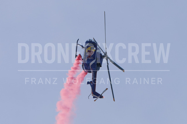 Audi FIS Ski World Cup: Men’s Slalom – Hahnenkamm Race, Kitzbuehel | Kitzbuehel, Austria, 25.Jan.26 - Alpine Skiing - FIS World Cup, Hahnenkamm Race, Slalom, men. The image shows red bull helicopter air show.