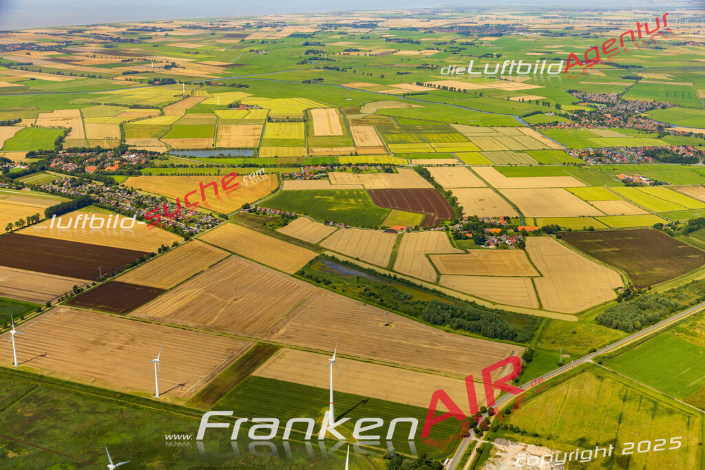 Klassische Luftaufnahme ohne Drohne zeigt:Wybelsum bei Emden - Die Luftbildaufnahme wurde 2025 vom UL-Flugzeug heraus erstellt ( keine Drohnenaufnahme ) - Hochauflösende Luftaufnahme -Nicht vergleichbar mit Google Maps oder Satelittenbilder- Die Geschenkidee !Mit Lizenz und Bildrechte bestellbar