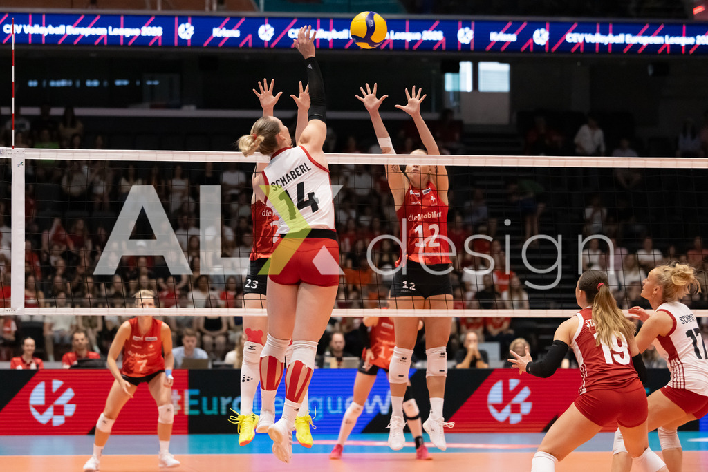 Austria v Switzerland - CEV European League Women | KRIENS, SWITZERLAND - JUNE 14: KORA MARINA SCHABERL of Austria attack / spike against FABIANA BRANCA of Switzerland and MERET AARDEN double block during the CEV European League match between Austria and Switzerland at Pilatus Arena on June 14, 2026 in Kriens, Switzerland. - Realisiert mit Pictrs.com