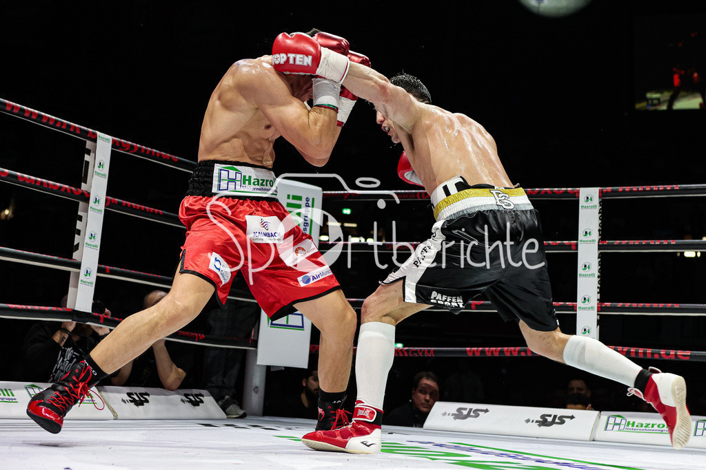 Profi - Box - Gala / Main Event | Robin KRASNIQI (rote Hose) in seinem Kampf gegen Rimour NIKARKHOEV (Schwarze Hose)