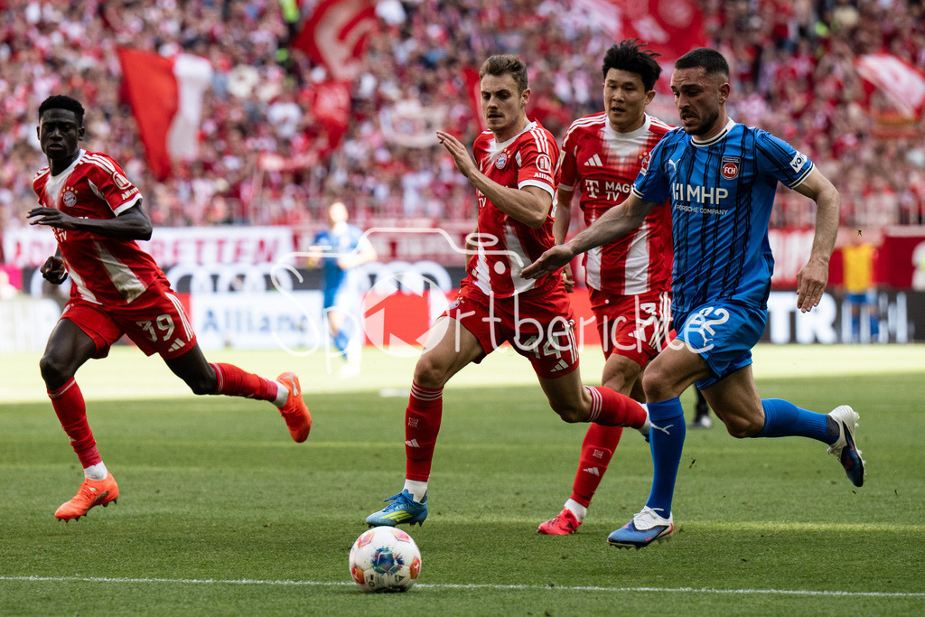 FC Bayern München - 1. FC Heidenheim | MUNICH, GERMANY - 02. MAI: im Duell Josip STANISIC (FC Bayern Munich 44) und Arijon IBRAHIMOVIC (1. FC Heidenheim 22) während dem Bundesligamatch zwischen dem FC Bayern München und dem 1. FC Heidenheim am 32. Spieltag in der Allianz Arena / DFL REGULATIONS PROHIBIT ANY USE OF PHOTOGRAPHS AS IMAGE SEQUENCES AND/OR QUASI-VIDEO