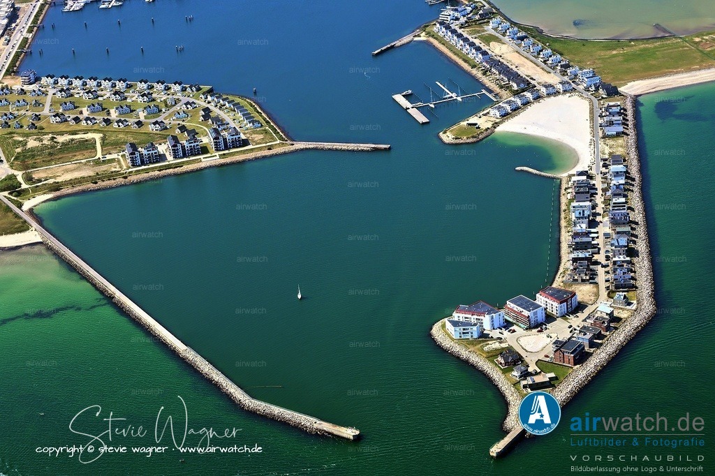 Luftbilder Ostseefjord Schlei, Maasholm, Port Olpenitz, Schleimünde | Die jüngsten Entwicklungen zeigen eine fortlaufende Bautätigkeit trotz finanzieller Unsicherheiten, was Hoffnungen auf eine Belebung des Standorts nährt.