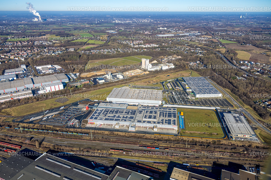 Dortmund260200128 | Luftbild, Gewerbegebiet mit Tesla Delivery Hub Dortmund Innenstadt-Nord, Bergisch Westerwälder Hartsteinwerke, Logistikzentrum Rewe und Logistikzentrum Amazon, Walzwerkstraße, Borsigplatz, Dortmund, Ruhrgebiet, Nordrhein-Westfalen, Deutschland