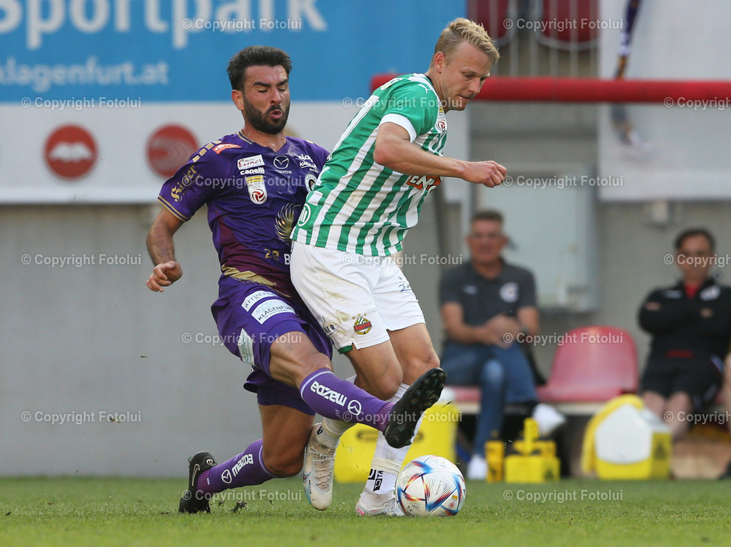 A_LUI_03062023_10 | SPORT,FUSSBALL,ADMIRAL BUNDESLIGA AUSTRIA KLAGENFURT-SK RAPID WIEN 03.06.2023 IM BILD: KOSMAS GEZOS  (KLAGENFURT) UND MARCO GRUELL (RAPID) FOTOLUI/MW