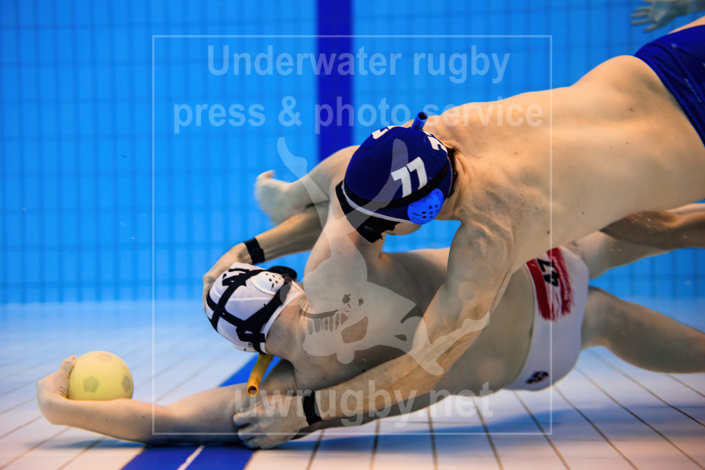 Underwater rugby action press picture | Bamberg, Germany - March 04 2023: Underwater rugby training camp of the Tauchclub Bamberg together with the Austrian national team. - Realisiert mit Pictrs.com