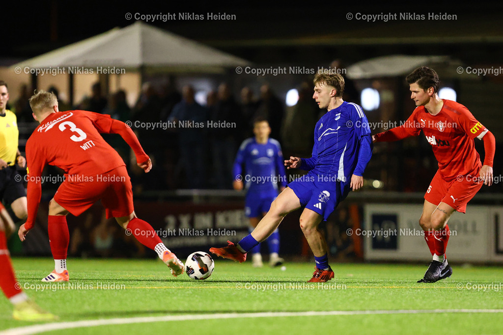 NH_FCKiliaKiel_TuSRotenhof_FlensOberliga_18032026 | #15 Florian Foit (FC Kilia Kiel), #18 Henry Grothkopp (TuS Rotenhof)Fußball I Herren I Flens Oberliga I Saison 2025-2026 I 18. Spieltag I FC Kilia Kiel - TuS Rotenhof I 18.03.2026 I Kilia Stadion