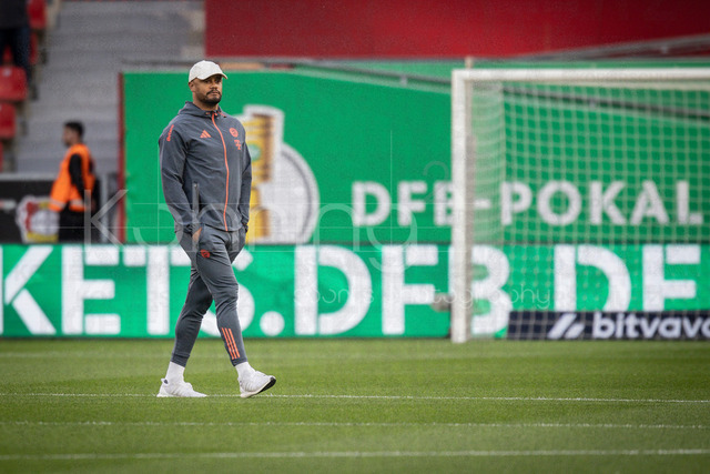 DFB Cup semifinal match Bayer 04 Leverkusen vs. FC Bayern Munich, 22.04.2026 | LEVERKUSEN, GERMANY - APRIL 22, 2026: Vincent Kompany (Head Coach FC Bayern Muenchen) in front of a DFB Pokal logo before the German DFB Cup semifinal match between Bayer 04 Leverkusen vs. FC Bayern Munich at BayArena on April 22, 2026 in Leverkusen, Germany. DFL REGULATIONS PROHIBIT ANY USE OF PHOTOGRAPHS AS IMAGE SEQUENCES AND/OR QUASI-VIDEO.