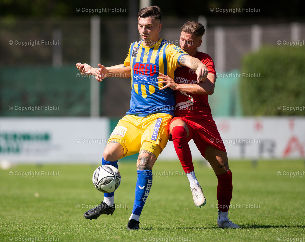 A_LUI120823_14 | SPORT,FUSSBALL,LL. OST ASKOE OEDT 1B-ASKOE DONAU LINZ 12.08.2023 IM BILD: MICHAEL LEONHARTSBERGER   (OEDT 1B) UND EDWIN SKRGIC (DONAU LINZ) FOTO:FOTOLUI