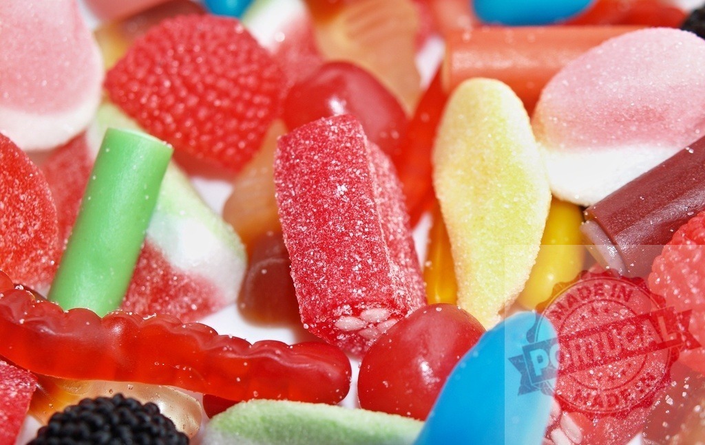 Colorful assorted candies filling frame with sugar | Assorted colorful candies and sweet treats forming a vibrant background - Realisiert mit Pictrs.com