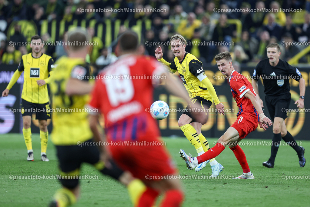 BVB13092402235 | 13.09.2024, 1. Fußball Bundesliga, Borussia Dortmund - 1. FC Heidenheim 1846, Signal Iduna Park, Saison 2024 2025: Julian Brandt (BVB #10) gegen Jan Schöppner (Heidenheim #3)DFB regulations prohibit any use of photographs as image sequences and or quasi-video.
