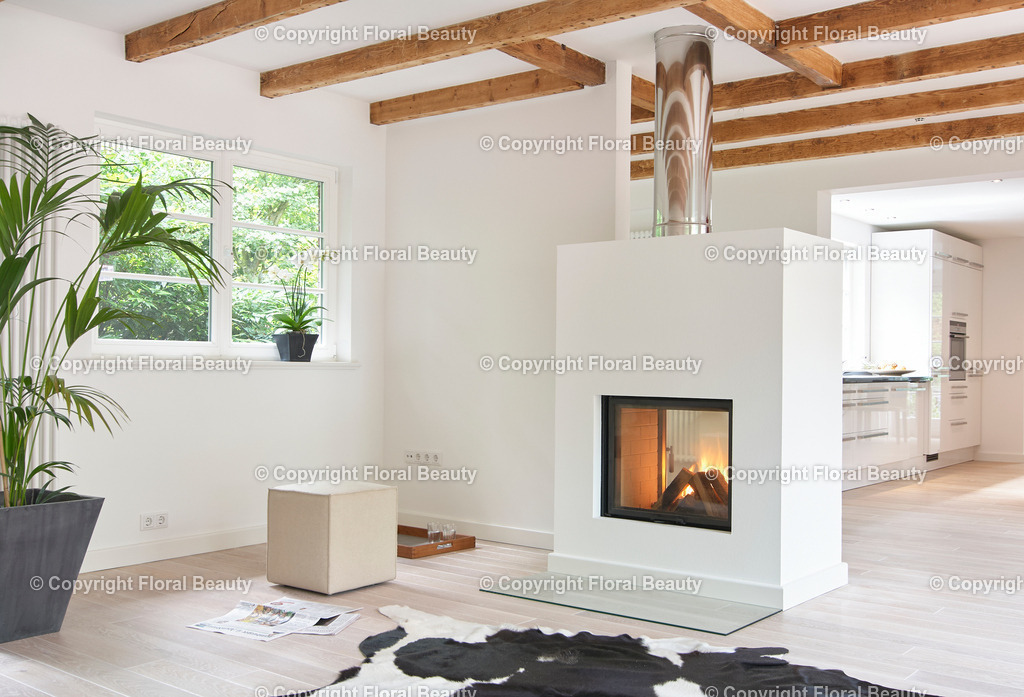 Umbau eines Rotklinkerhauses | Kamin als Raumteiler zwischen Küche und Wohnzimmer - Realisiert mit Pictrs.com