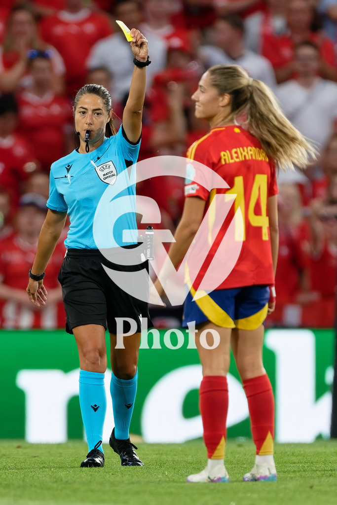 Spain v Switzerland - UEFA Women's EURO 2025 Quarter-Final | BERN, SWITZERLAND - JULY 18: Maria Sole Ferrieri Caputi, referre, (L)  gives a yellow card to Laia Aleixandri of Spain (R)  during the UEFA Women's EURO 2025 Quarter-Final match between Spain v Switzerland at Stadion Wankdorf on July 18, 2025 in Bern, Switzerland. (Photo by Giuseppe Velletri/Sports Press Photo/Getty Images)