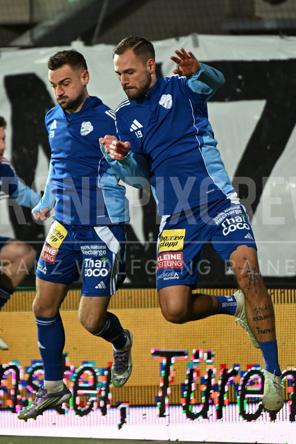 TSV Egger Glas Hartberg vs SV Oberbank Ried – Austrian Bundesliga Match | The image shows Juergen Heil (Hartberg) and Lukas Spendlhofer (Hartberg), at the Bundesliga match TSV Hartberg vs SV Ried at Profertil Arena Hartberg. 22.11.2025