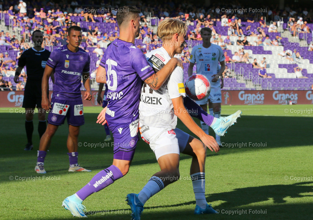 A_LUI_11082024_07 | SPORT,FUSSBALL,ADMIRAL BUNDESLIGA AUSTRIA WIEN-RZ PELLETS WAC  11.08.2024 IM BILD: ALEKSANDAR DRAGOVIV (AUSTRIA WIEN) UND ERIK KOJZEK  (WAC) ) FOTO:FOTOLUI/MW
