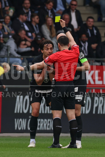 SK Puntigamer Sturm Graz vs TSV Egger Glas Hartberg – Championship Group    | Graz, Austria, 12.Apr.26 - SOCCER - ADMIRAL Bundesliga, SK Puntigamer Sturm Graz vs TSV Egger Glas Hartberg. The image shows Albert Vallci (STU) do not understand why he becomes the yellow card.    