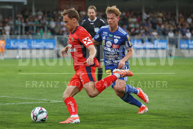 TSV Egger Glas Hartberg vs SK Rapid Wien – Championship Group    | Hartberg, Austria, 19.Apr.26 - SOCCER - ADMIRAL Bundesliga, TSV Egger Glas Hartberg vs SK Rapid Wien. The image shows Nikolaus Wurmbrand (SK Rapid Wien) and Fabian Wilfinger (Hartberg). 
