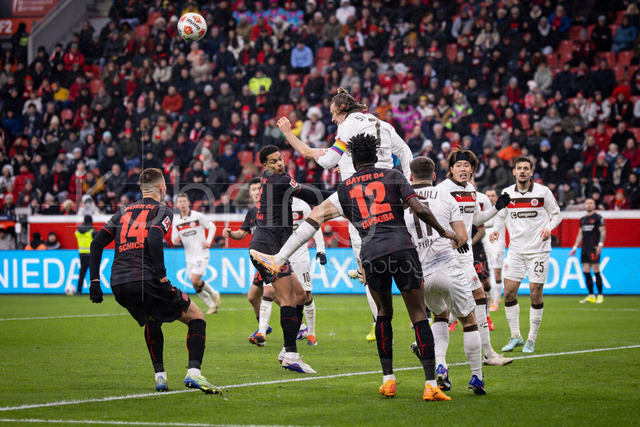 Bayer 04 Leverkusen vs. FC St. Pauli, 14.02.2026 | LEVERKUSEN, GERMANY - FEBRUARY 14:  Jackson Irvine (FC St. Pauli, 7) defends with a header during the Bundesliga match (gameday 22)  between Bayer 04 Leverkusen vs. FC St. Pauli at BayArena on February 14, 2026 in Leverkusen, Germany. Patrik Schick (Bayer 04 Leverkusen, 14), Jarell Quansah (Bayer 04 Leverkusen, 4), Edmond Tapsoba (Bayer 04 Leverkusen, 12), Arkadiusz Pyrka (FC St. Pauli, 11), Tomoya Ando (FC St. Pauli, 15), Adam Dzwigata (FC St. Pauli, 25). (Photo by Axel Kohring/Beautiful Sports Int.)DFL REGULATIONS PROHIBIT ANY USE OF PHOTOGRAPHS AS IMAGE SEQUENCES AND/OR QUASI-VIDEO.