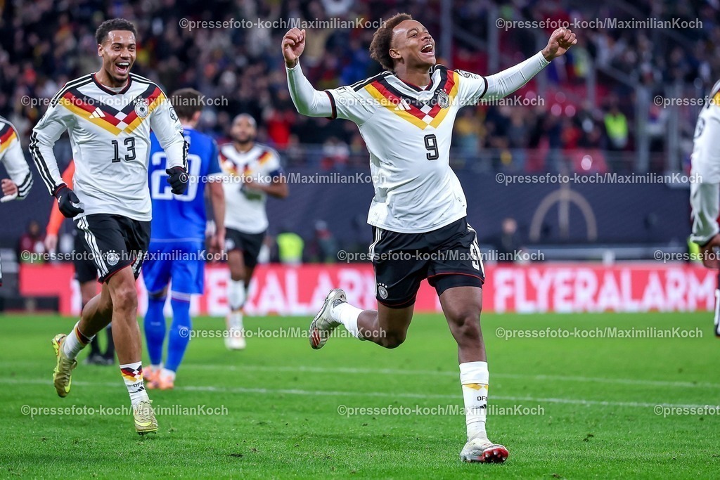 DFB17112503047 | 17.11.2025, Fußball, Länderspiel, WM-Qualifikation Europa, Deutschland - Slowakei, Red Bull Arena (Leipzig), 10. Spieltag, Saison 2025 2026: Torjubel nach dem Tor zum 6:0 durch Torschütze Forzan Assan Ouedraogo (GER #09)  zusammen mit   Felix Nmecha (GER #13) Regulations prohibit any use of photographs as image sequences and or quasi-video.