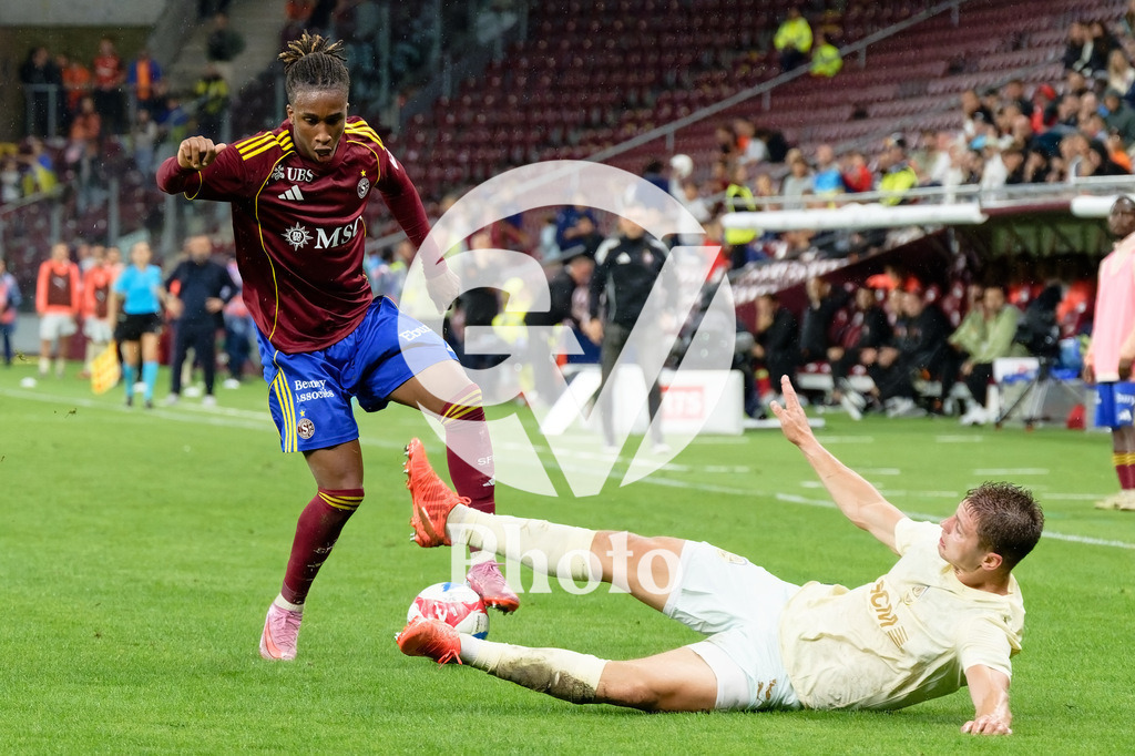 UEFA Conference League Play-offs 2nd leg - Servette FC v FC Shakhtar Donetsk | Keyan Varela (29 Servette FC) Valeriy Bondar (5 FC Shakhtar Donetsk) battle for the ball (duel)  during the UEFA Conference League Play-offs 2nd leg match between Servette FC and FC Shakhtar Donetsk at Stade de Geneve in Geneva, Switzerland