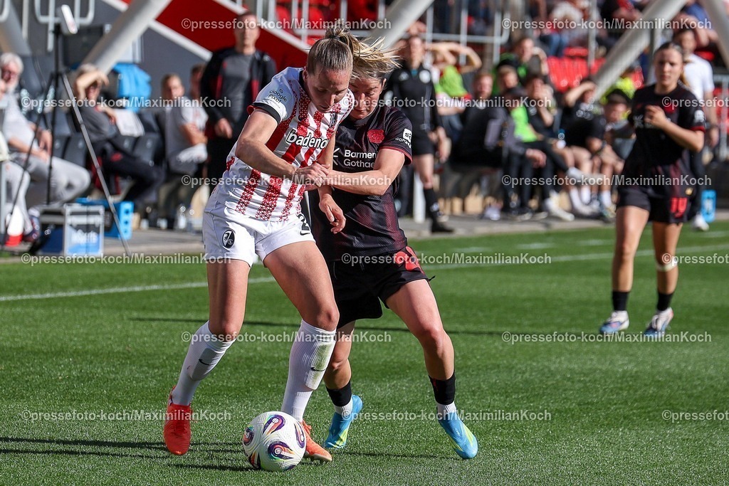 xsscx26042601023 | 26.04.2026, xsscx, Frauen Fussball, Bayer 04 Leverkusen - SC Freiburg, 1. Fussball Bundesliga, 23. Spieltag, Ulrich-Haberland-Stadion, Saison 2025 2026: Lisa Karl (SC Freiburg #02) im Zweikampf gegen Ruby Grant (Bayer Leverkusen #22) DFB regulations prohibit any use of photographs as image sequences and or quasi-video. Photo: xSandraxScherningxPressefotoKochx