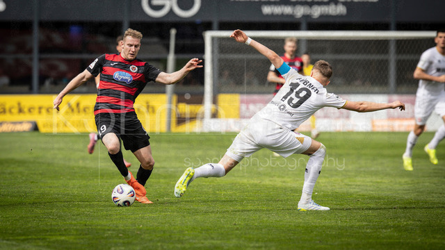 Viktoria Koeln vs. SV Wehen Wiesbaden, 11.04.2026 | KOELN, GERMANY - APRIL 11, 2026:  Meiko Sponsel (Viktoria Köln, 19), Florian Huebner (Hübner, SV Wehen Wiesbaden, 19) during the 3rd division match between Viktoria Koeln vs. SV Wehen Wiesbaden at the Sportpark Hoehenberg on matchday 7 on April 11, 2026 in Koeln, Germany. DFL REGULATIONS PROHIBIT ANY USE OF PHOTOGRAPHS AS IMAGE SEQUENCES AND/OR QUASI-VIDEO.
