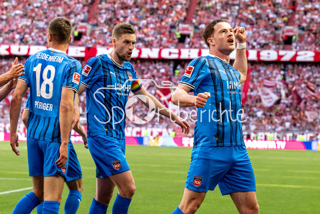 FC Bayern München - 1. FC Heidenheim | MUNICH, GERMANY - 02. MAI: Jubel der Gäste nach dem Treffer zum 0-1 durch Budu ZIVZIVADZE (1. FC Heidenheim 11) während dem Bundesligamatch zwischen dem FC Bayern München und dem 1. FC Heidenheim am 32. Spieltag in der Allianz Arena / DFL REGULATIONS PROHIBIT ANY USE OF PHOTOGRAPHS AS IMAGE SEQUENCES AND/OR QUASI-VIDEO