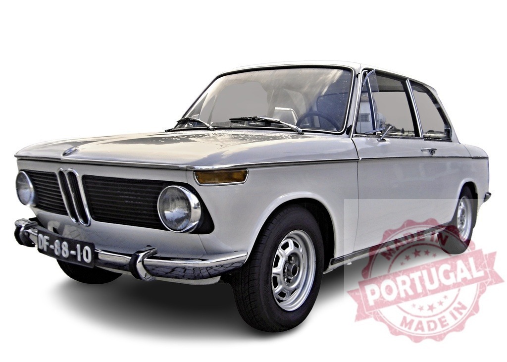 White BMW 1602 embodies timeless elegance and classic German engineering | Classic white BMW 1602 parked, representing vintage German automotive design - Realisiert mit Pictrs.com