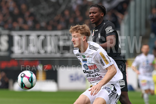 SK Puntigamer Sturm Graz vs TSV Egger Glas Hartberg – Championship Group    | Graz, Austria, 12.Apr.26 - SOCCER - ADMIRAL Bundesliga, SK Puntigamer Sturm Graz vs TSV Egger Glas Hartberg. The image shows Konstantin Schopp (Hartberg) and Seedy Jatta (STU).    