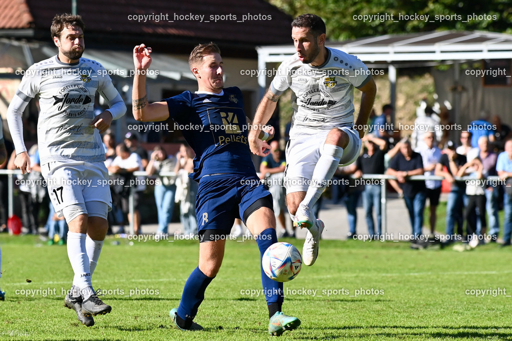ATUS Velden vs. ASKÖ Köttmannsdorf 7.10.2023 | #17 Stephan Borovnik (K) Köttmannsdorf, #8 Fabian Kopeinig ATUS Velden, #19 Christopher Sallinger Köttmannsdorf, ATUS Velden vs. ASKÖ Köttmannsdorf 7.10.2023, ATUS Velden vs. ASKÖ Köttmannsdorf am 07.10.2023 in Velden (Wald Arena Velden), Austria, (Photo by Bernd Stefan)