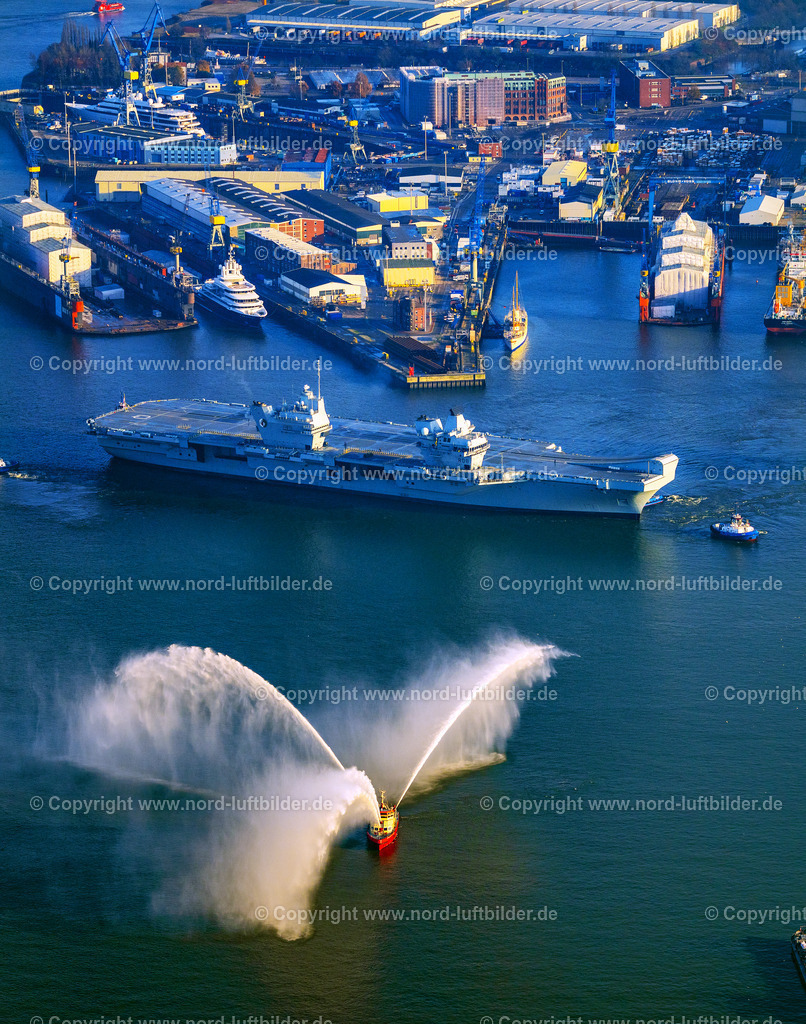 Hamburg_Flugzeugträger_Queen_Elisabeth_ELS_3269231124 | HAMBURG 23.11.2024 Graufarbener Flugzeugträger und Kriegs- Schiff der britischen Marine Royal Navy HMS "Queen Elizabeth" im Ortsteil Steinwerder in Hamburg, Deutschland. Weiterführende Informationen bei: Hamburger Hafen und Logistik Aktiengesellschaft. // Grey aircraft carrier and warship of the British Royal Navy HMS "Queen Elizabeth" in the Steinwerder district of Hamburg, Germany. Further information at: Hamburger Hafen und Logistik Aktiengesellschaft. Foto: Martin Elsen
