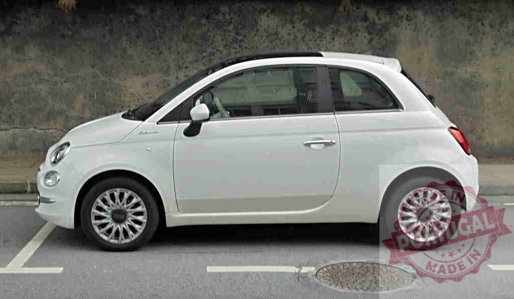 White Fiat 500 car parked on city street | White Fiat 500 compact car parked on urban street, side view - Realisiert mit Pictrs.com