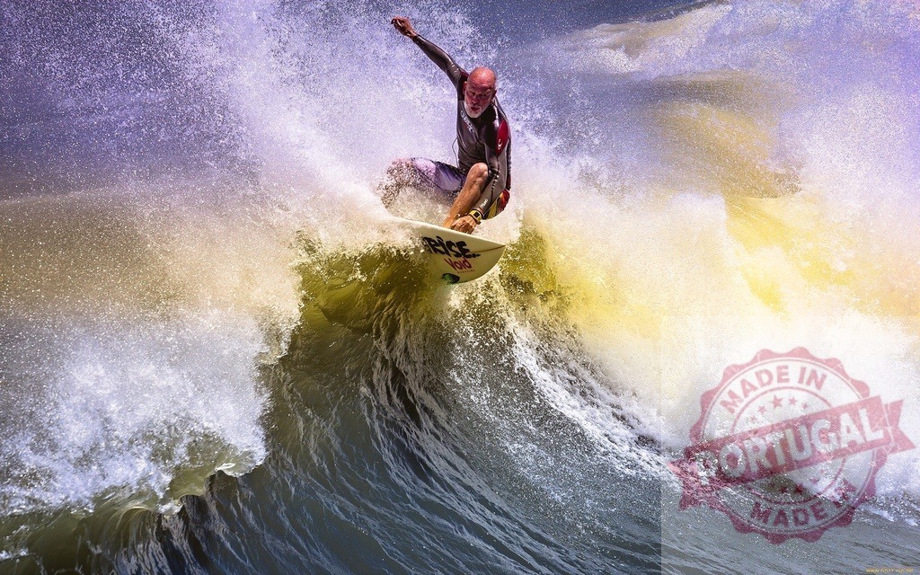 Surfer riding ocean wave during competition, performing trick | Athletic surfer riding big ocean wave during surfing competition, performing a surfing trick - Realized with Pictrs.com