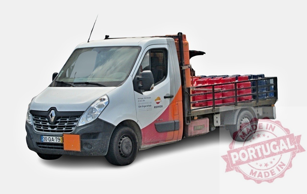 Renault Master carrying gas bottles for Repsol, isolated on white | Small truck carrying gas bottles for Repsol, isolated on white background - Realized with Pictrs.com