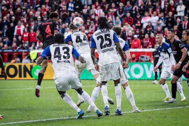 German Bundesliga, Bayer 04 Leverkusen vs. Hamburger SV, 16.05.2026 | LEVERKUSEN, GERMANY - MAY 16, 2026 :  Jarell Quansah (Bayer 04 Leverkusen, 4) heads leading to the 1-1 during the German Bundesliga match on gameday 34 between Bayer 04 Leverkusen vs. Hamburger SV at BayArena on May 16, 2026 in Leverkusen, Germany. DFL REGULATIONS PROHIBIT ANY USE OF PHOTOGRAPHS AS IMAGE SEQUENCES AND/OR QUASI-VIDEO.