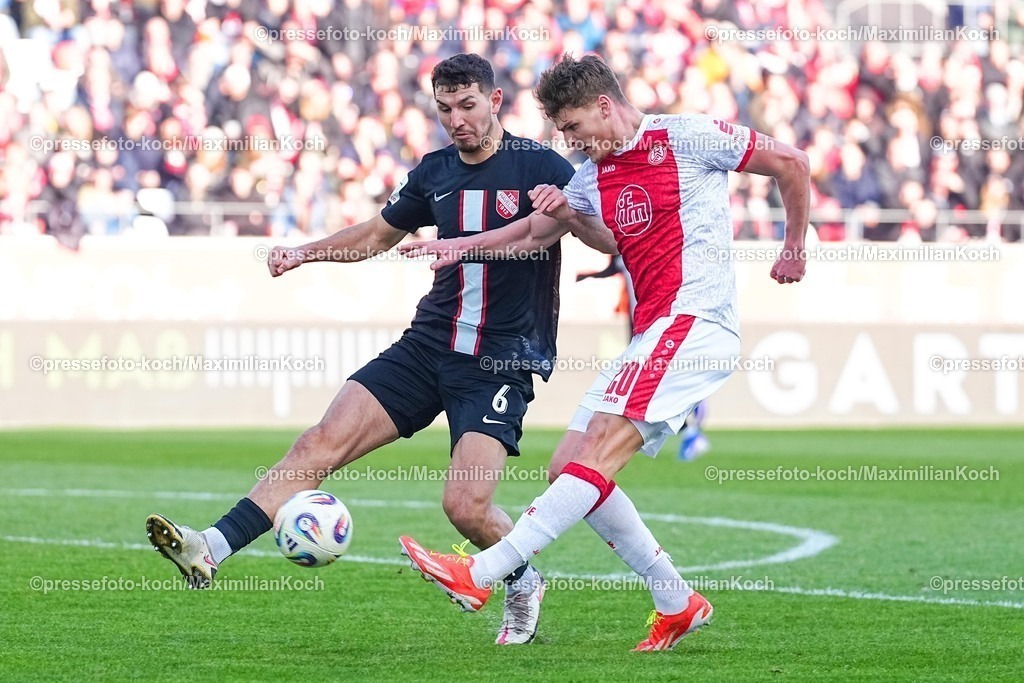 xYDRx24012601023 | 24.01.2026, xydrx, Fußball, 3.Liga, Rot-Weiss Essen - TSV Havelse, Saison 2025 2026, Stadion an der Hafenstraße: Semi Belkahia (TSV Havelse #6) im Zweikampf gegen Marek Janssen (Rot-Weiss Essen #20)    DFB regulations prohibit any use of photographs as image sequences and or quasi-video. Photo: xYannisxDreimannxPressefotoKochx