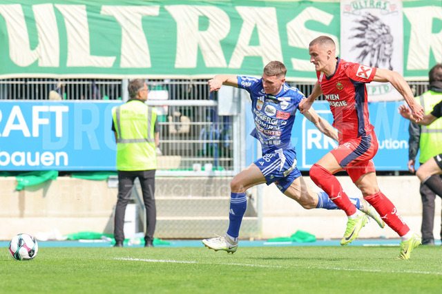 TSV Egger Glas Hartberg vs SK Rapid Wien – Championship Group    | Hartberg, Austria, 19.Apr.26 - SOCCER - ADMIRAL Bundesliga, TSV Egger Glas Hartberg vs SK Rapid Wien. The image shows Elias Havel (Hartberg) and Nenad Cvetkovic (SK Rapid Wien). 