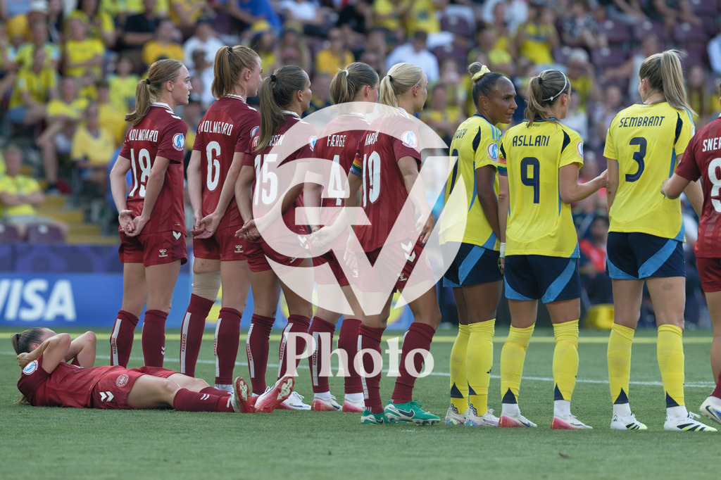 Denmark v Sweden - UEFA Women's EURO 2025 Group C | GENEVA, SWITZERLAND - JULY 4: Wall of Denmark with a player laying down  during the UEFA Womens EURO 2025 Group C match between Denmark and Sweden at Stade de Geneve on July 4, 2025 in Geneva, Switzerland. (Photo by Giuseppe Velletri/Sports Press Photo/Getty Images)