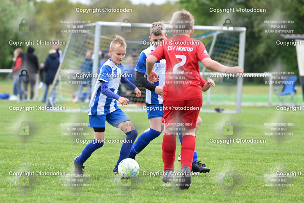 DSC_0104 | TSV Holtrop (rot) - TuS Holtriem I (blau,weiß) 