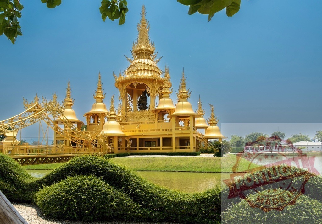 Wat Rong Khun, White Temple shining under blue sky in Chiang Rai, Thailand | The impressive golden building of the White Temple in Chiang Rai province, Thailand, is shining under a clear blue sky - Realized with Pictrs.com