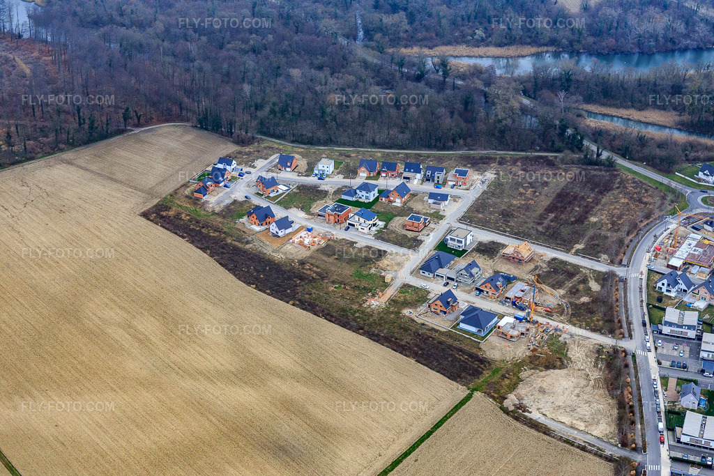 Aerial view: New development area Rue de l'orée du bois in Drusenheim in the state Bas-Rhin, France.Photo: IMG_086628.jpg taken on 03/19/2016 by Werner Riehm/FLY-FOTO.comResolution of the original: 5472 x 3648 px