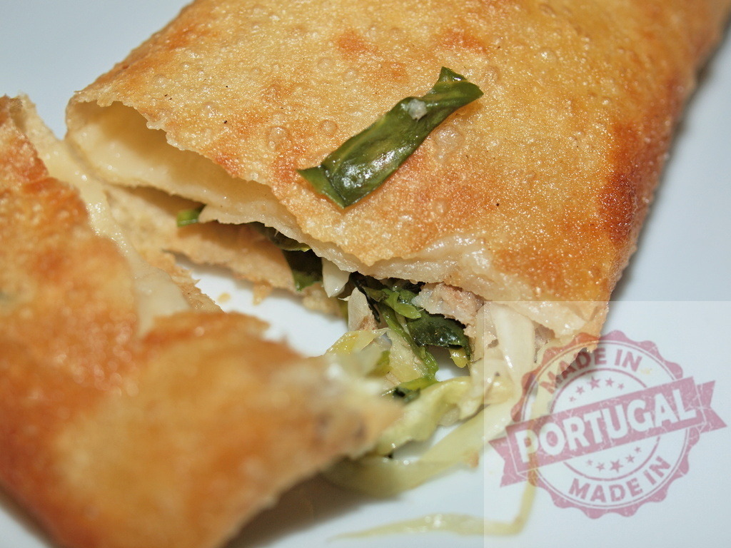 Crispy fried golden spring roll with vegetables and cheese | Delicious fried spring roll with green onions, cabbage, and melted cheese stuffing - Realized with Pictrs.com
