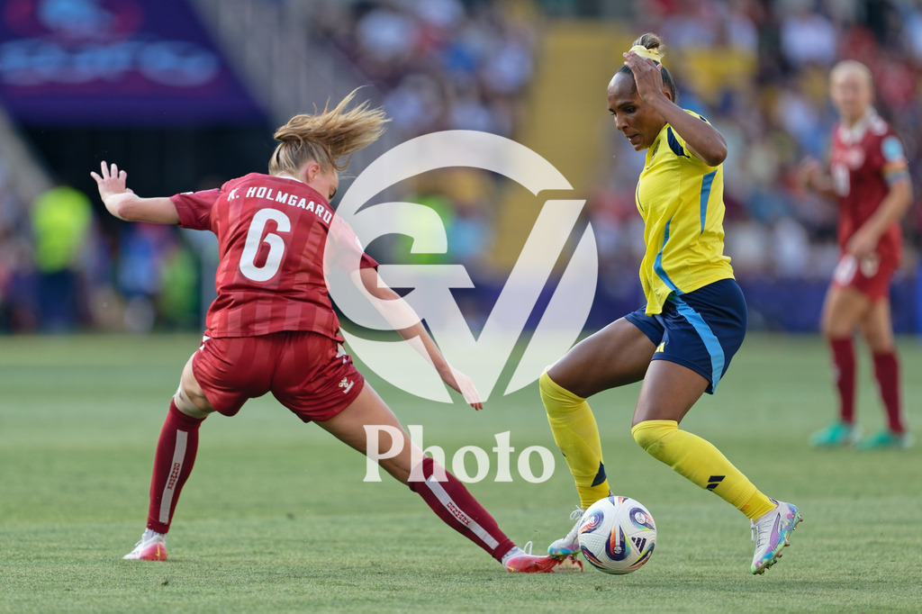 Denmark v Sweden - UEFA Women's EURO 2025 Group C | GENEVA, SWITZERLAND - JULY 4: Emma Faerge of Denmark (L) and Madelen Janogy of Sweden (R) fight for possession  during the UEFA Womens EURO 2025 Group C match between Denmark and Sweden at Stade de Geneve on July 4, 2025 in Geneva, Switzerland. (Photo by Giuseppe Velletri/Sports Press Photo/Getty Images)