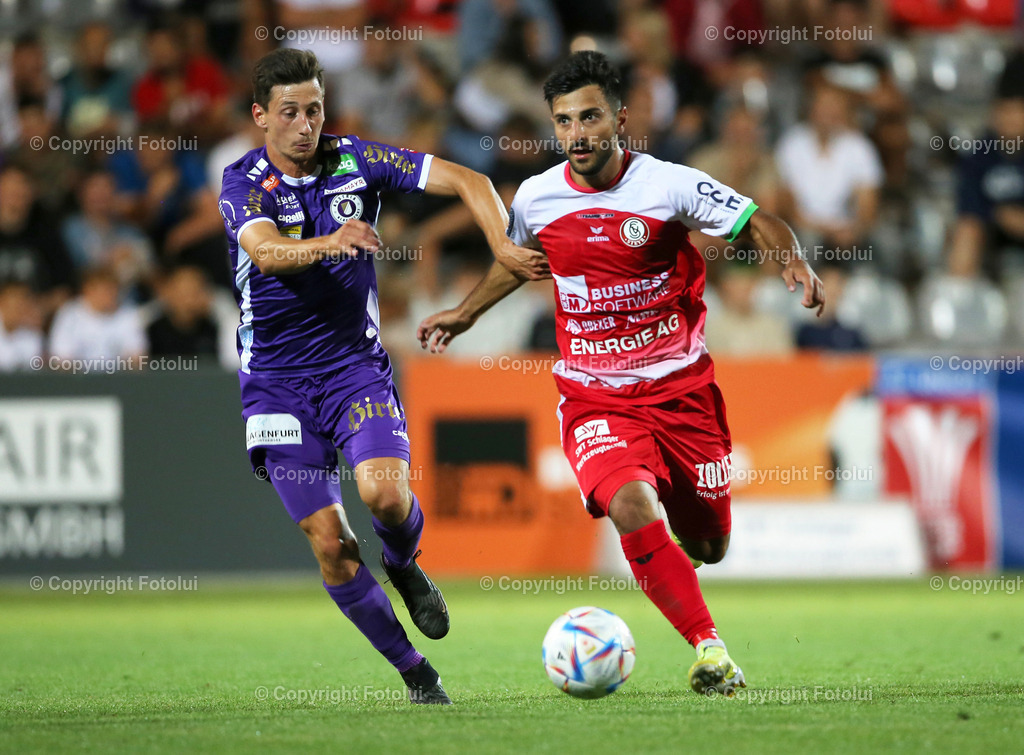 A_LUI_220723_09 | 1.RUNDE UNIQA OEFB CUP SK VORWAERTS STEYR-AUSTRIA KLAGENFURT 22.07.2023 IM BILD: TILL SCHUMACHER  (KLAGENFURT) UND OGUZHAN  SIVRIKAYA (VORWAERTS STEYR) FOTO:FOTOLUI/MW