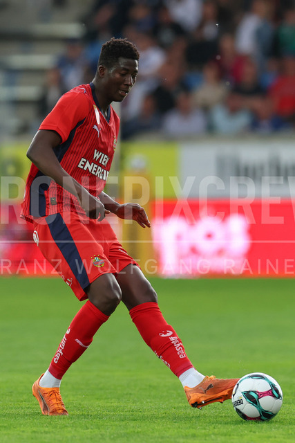 TSV Egger Glas Hartberg vs SK Rapid Wien – Championship Group    | Hartberg, Austria, 19.Apr.26 - SOCCER - ADMIRAL Bundesliga, TSV Egger Glas Hartberg vs SK Rapid Wien. The image shows Ange Ahoussou (SK Rapid Wien). 