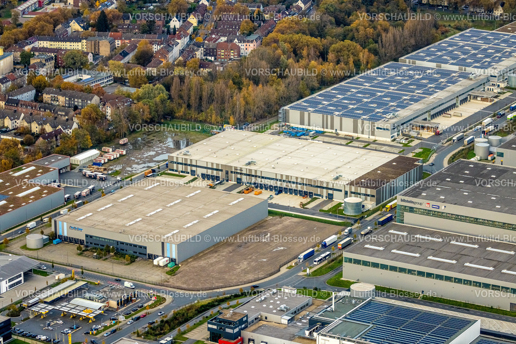 Gelsenkirchen231102925 | Luftbild, Industriepark Schalker Verein, Gewerbegebiet Europastraße, ProReServ Firmengebäude, Imperial Logistics Gebäude, Dokas Handelsgesellschaft mbH mit Solardach, umgeben von herbstlichen Laubbäumen, Altstadt, Gelsenkirchen, Ruhrgebiet, Nordrhein-Westfalen, Deutschland